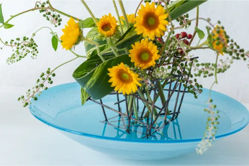 銅の花留め